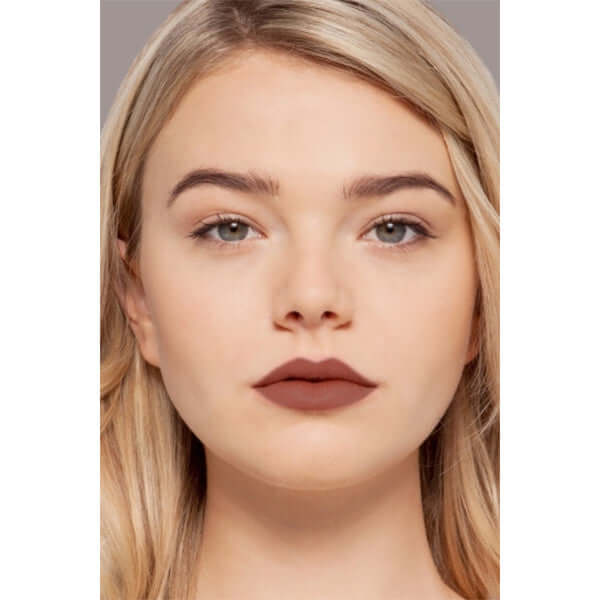 Brave Plush Rush Satin Matte Lipstick (cocoa matte) on blonde model