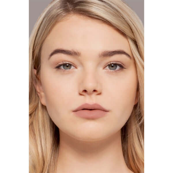 Clever Plush Rush Satin Matte Lipstick (soft nude) on blonde model