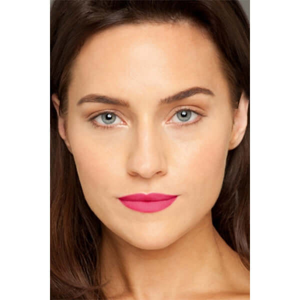 Dahling Moisture Matte Lipstick (vibrant pink) on caucasian model