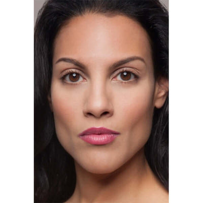 Delighted Plush Rush Lipstick (bright coral pink) on mixed ethnicity model