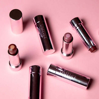  Double Date Plush Rush™ Tinted Lip Treatment (Rosy pink), pink background